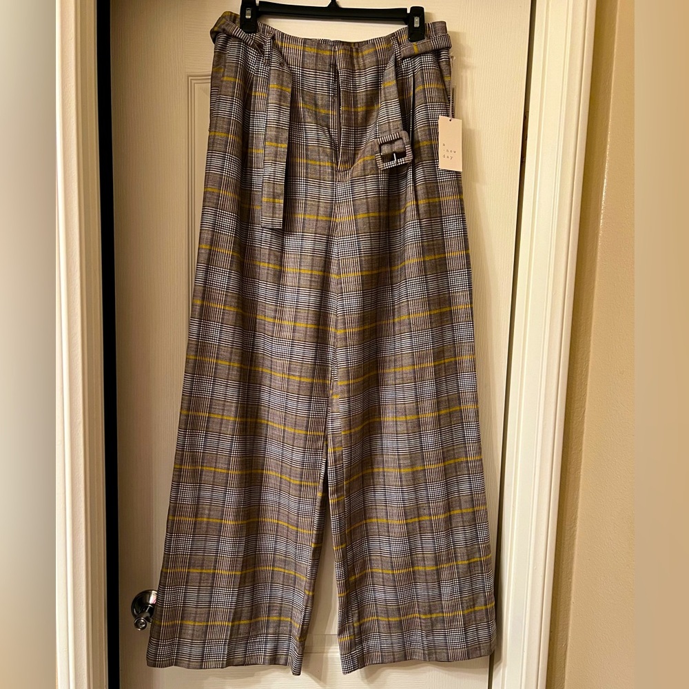 Brand new pair of plaid slacks. Brand is A New Day, size 10. Tag still in place.